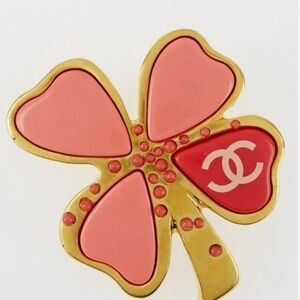 CHANEL
Goldtone/Pink Enamel
CC Four-Leaf Clover
Brooch